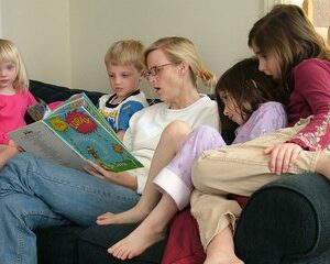 reading a book to children