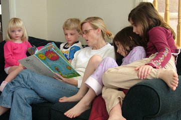 reading a book to children